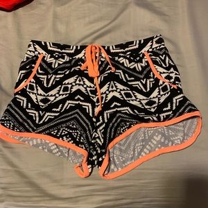 B/W/coral Aztec shorts. Size medium.